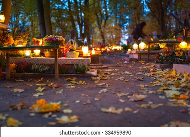 Colorful candles on the cemetery at All Saints Day, Poland