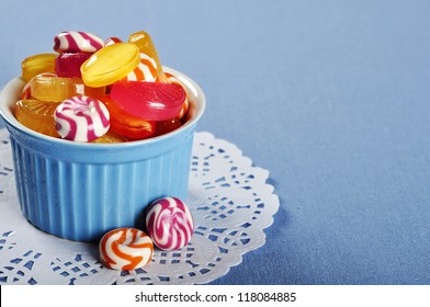 Colorful Candy In A Blue Ceramic Bowl Closeup