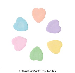 Colorful candy hearts isolated on white