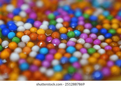 Colorful candy sprinkles in a close-up macro shot of Peruvian food: Turron "Doña Pepa". Traditional Sweet Nougat of Peru,served in October and related to the Lord of Miracles. - Powered by Shutterstock