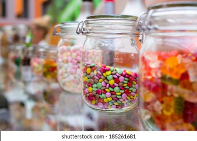 colorful candy, sprinkles in vintage glass jar