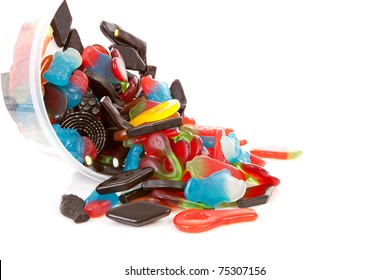 Colorful candy sweets isolated on white background - Shutterstock ID 75307156