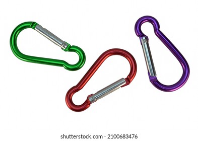 Colorful carabiners green red purple isolated