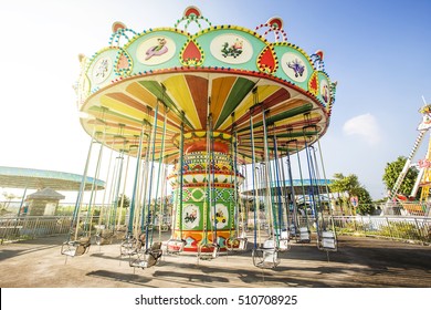 Colorful Carousel In Attraction Park