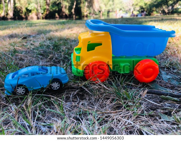 The colorful cars toys. typical toys for kids in\
the summer time.
