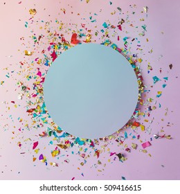 Colorful Celebration Background With Party Confetti On Pink Background. Flat Lay.