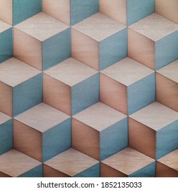 Colorful ceramic tile  with volume cube pattern for wall and floor decoration. Concrete stone surface background. Volume texture with     3 d geometric ornament for interior design project.