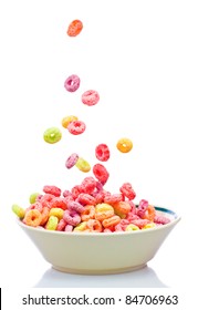 Colorful Cereal Falling On A Bowl On A White Background