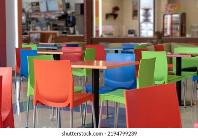 Colorful Chairs And Tables In The Cafe.No People, Empty Interior