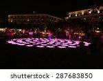 Colorful changing lights on discs in Centennial Square on Clematis Street in downtown West Palm Beach, Florida