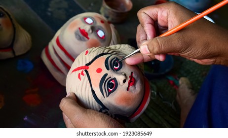Colorful Chhau (or chhou) masks on making , handicrafts on display at Charida, Purulia, West Bengal, India. Chhau or Chhou is traditional tribal dance festival of India. Selective focus used.
