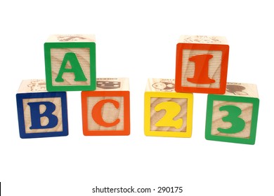Colorful children blocks over white. ABC and 123.