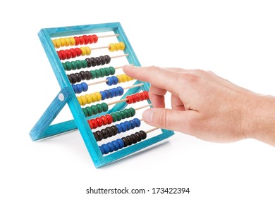 Colorful children's accounts and men hand does the calculations. Accountant on a white background.