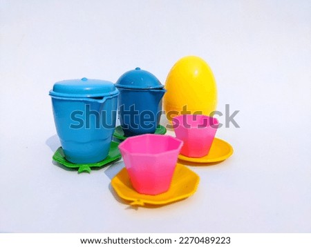 colorful children's toy containers and cups