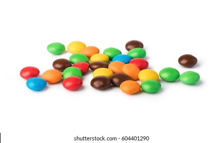 botones de chocolate coloridos sobre un fondo blanco