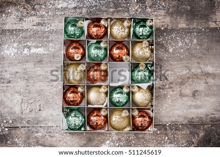 Similar – Christmas balls in box on rustic wooden background