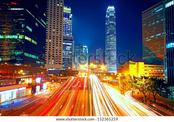 Colorful city night with lights of cars motion
blurred in hong kong