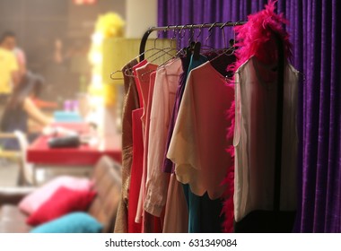 The Colorful Clothes Rack In A Backstage Room Of Fashion Show