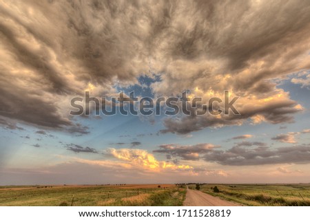 Colorful clouds in the setting sun on the Great Plains during summertime