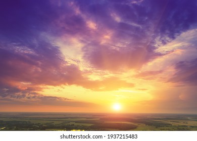 Colorful cloudy sky in countryside at sunset. Gradient color.  