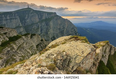 Colorful cloudy sky over rocky mountains,Bucegi mountains,Carpathians,Romania