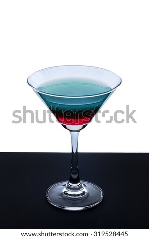 Colorful cocktail in martini glass