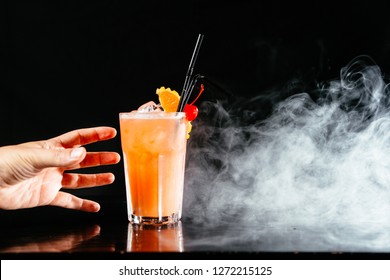 Colorful Cocktail On Black Background. Man Taking Cocktail Drink. Hand Grabbing Alcoholic Drinks.