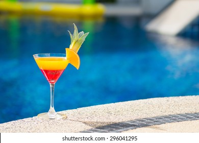 Colorful Cocktail With Orange By The Pool, Drink