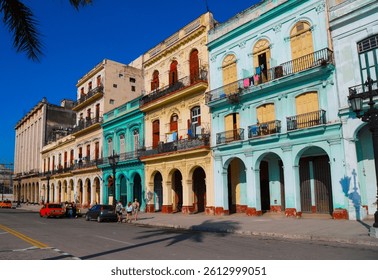 Colorful colonial buildings with balconies in Old Havana, Cuba. A classic Cuban street scene with vintage cars and vibrant architecture.
 - Powered by Shutterstock - Get 15% off with code: PIKWIZARD15