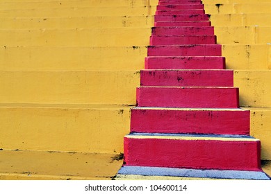 Colorful Concrete Bleachers At A High School Football Stadium