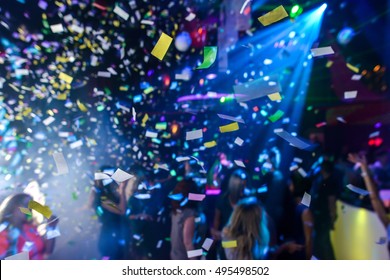 Colorful Confetti Falling To A Crowded Nightclub