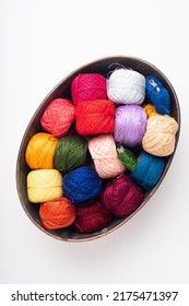 Colorful Cotton Yarns In A Copper Bowl