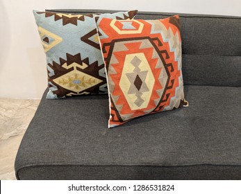 Colorful Couch Cushions On Grey Futon In Mid Century Modern Decor