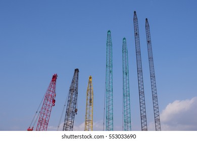 colorful crane tower was arranged in order of high in clearsky - Shutterstock ID 553033690
