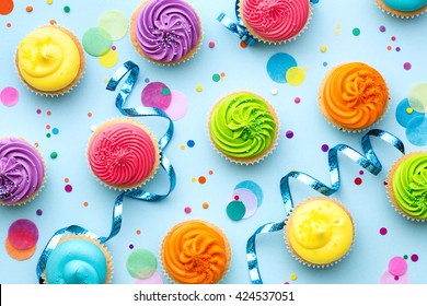 Colorful Cupcake Party Background On Blue