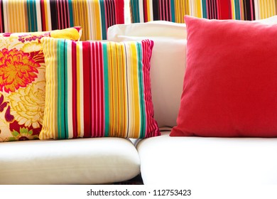 Colorful Cushions In Sofa.