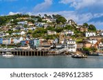 Colorful Dartmouth Lower Ferry to Kingwear Harbor Crossing the River Dart Devon England. Lower Ferry operates from center of Dartmouth first created in 1365.