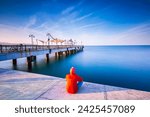 Colorful daytime long exposure with neutral density filter of Atakum Pier and a visitor. 11 February, 2020. Samsun, Turkey.