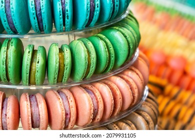 Colorful delicious French macarons pyramid for the candy bar for wedding or happy birthday party, st Valentines day, 8 march, international women day, Mother Day.