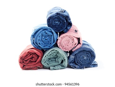  colorful denim/jeans bunch/pile rolled - Powered by Shutterstock