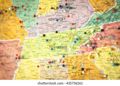 Colorful Detail Map Macro Close Up With Push Pins Marking Locations Throughout The United States Of America Kentucky KY Tennessee TN
