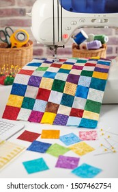Colorful Detail Of Quilt Sewn From Square Pieces On Sewing Machine, Quilting And Sewing Accessories