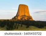 colorful devil tower at sunset.