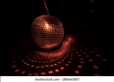 Colorful Disco Mirror Ball Lights Night Club Background. Party Lights Disco Ball. Selective Focus