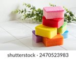 
Colorful dish sponges. Kitchen sponge on a white background.