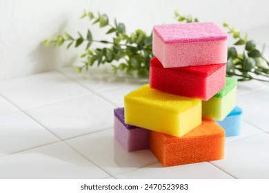 
Colorful dish sponges. Kitchen sponge on a white background.