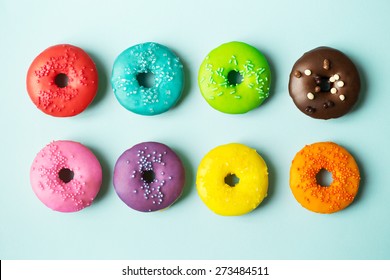 Colorful donuts on a blue background