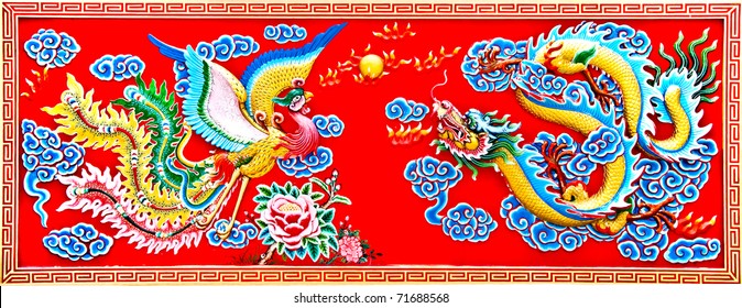 The Colorful of dragon and phoenix on wall of  joss house