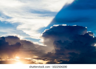 colorful dramatic sky with cloud at sunset.