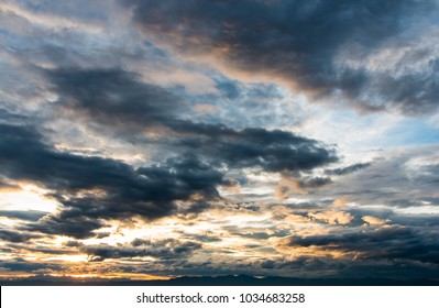Colorful dramatic sky with cloud at sunset.